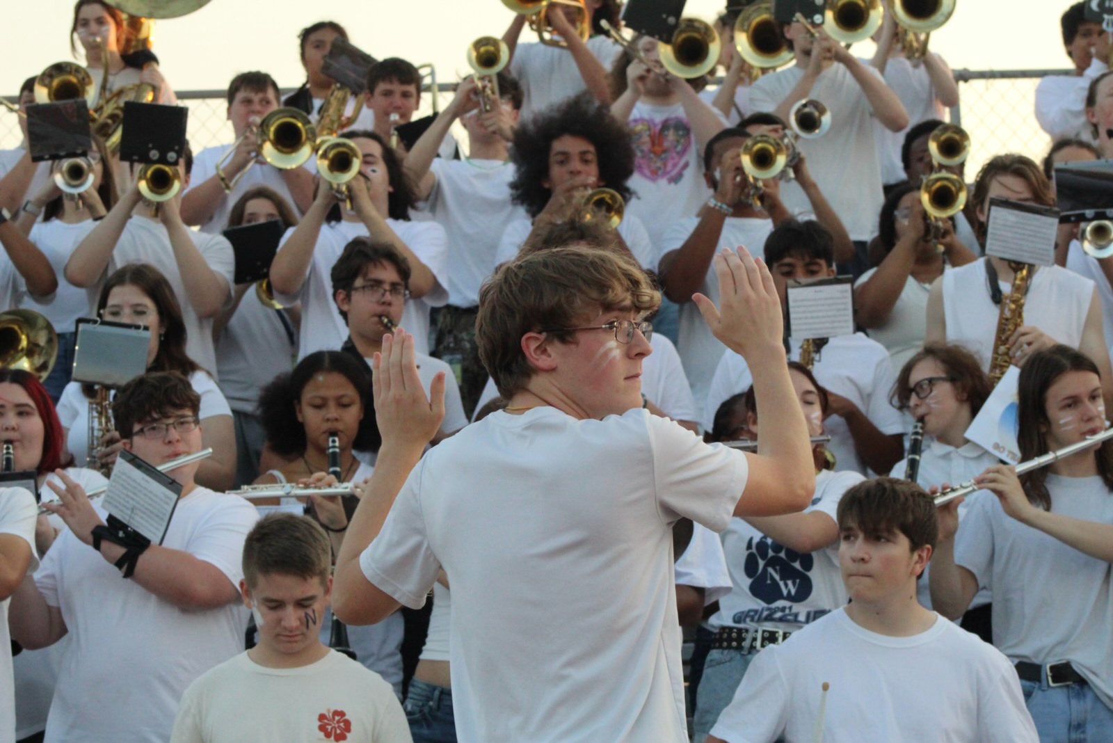 Drum Major Ben Shaffer directs the band in the stands at the Carroll Game on Sept. 6.